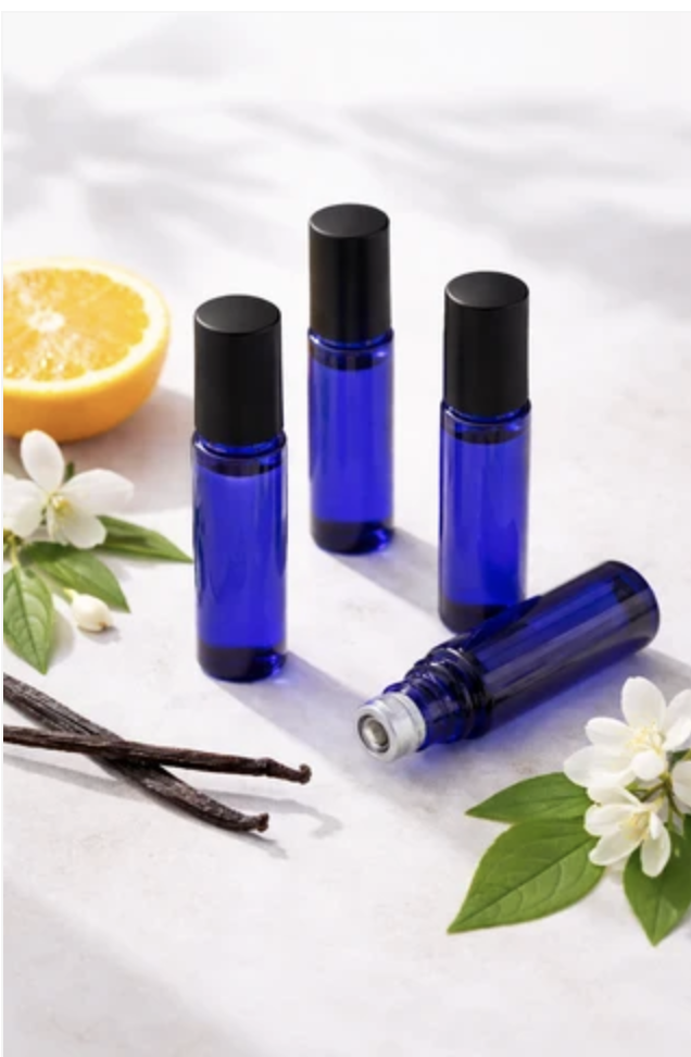 Central Coast Lavender botanical essence roller bottles with orange, vanilla bean, and blossom